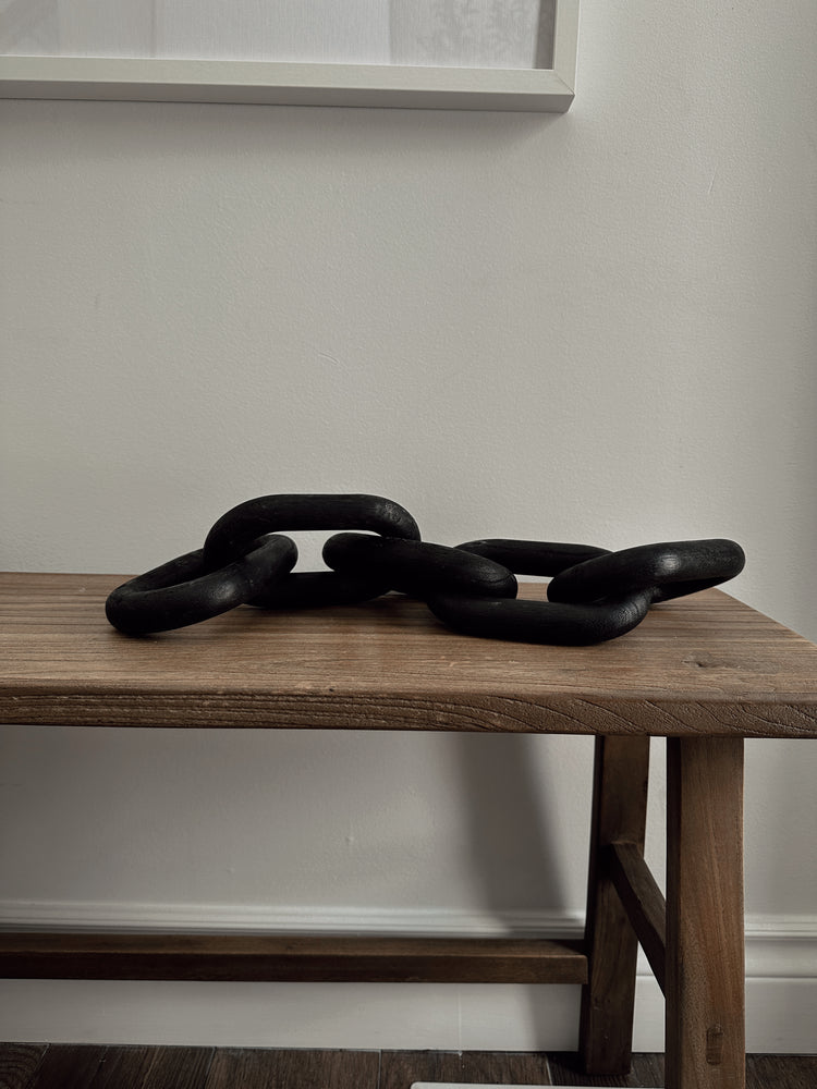 carved wood links in black