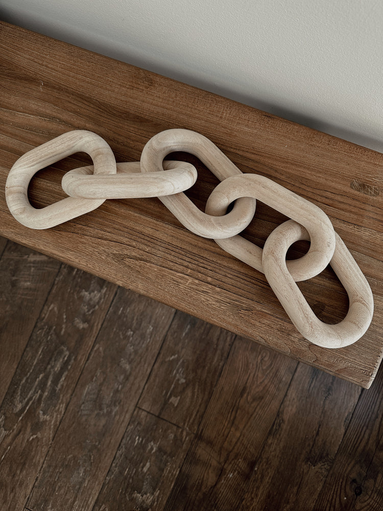 carved wood links in natural
