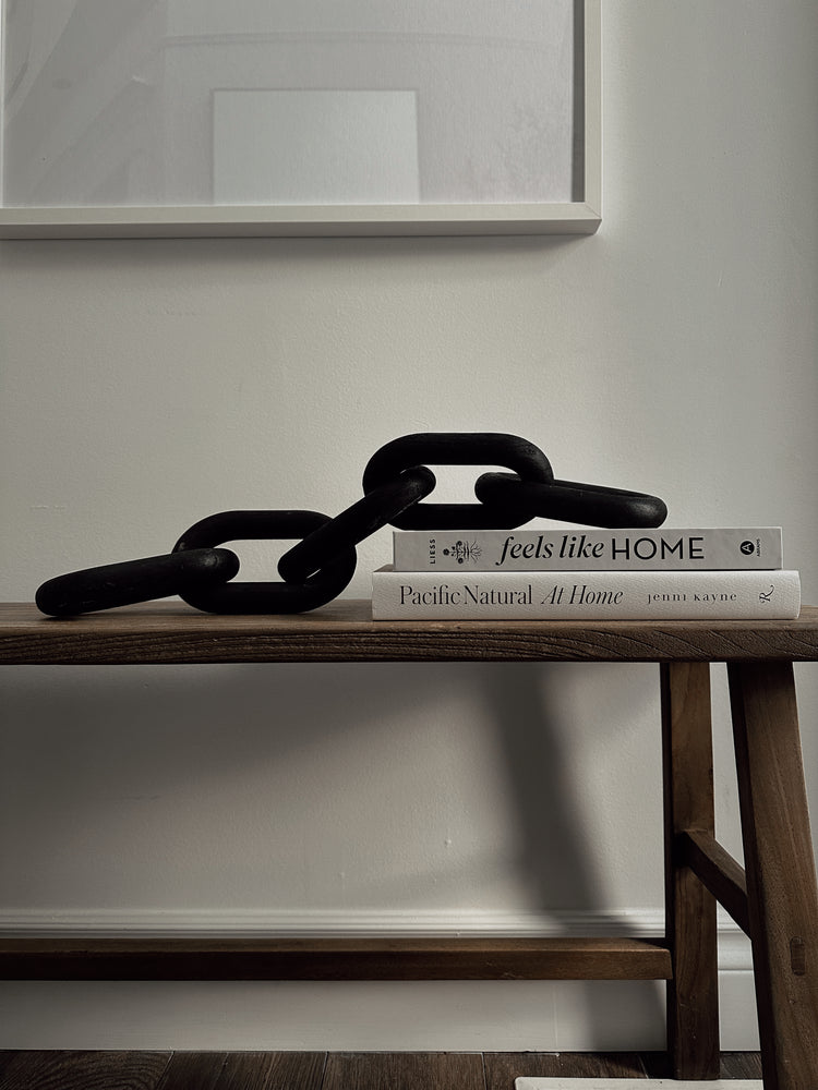 carved wood links in black