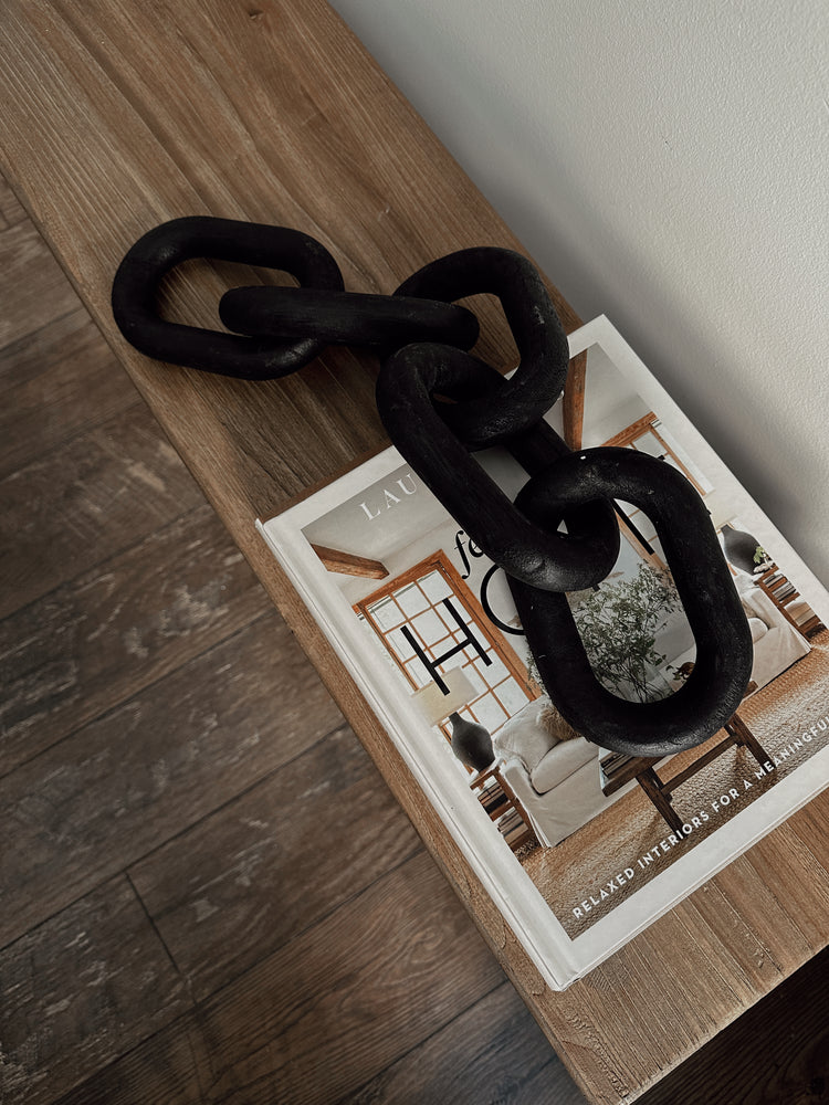 carved wood links in black