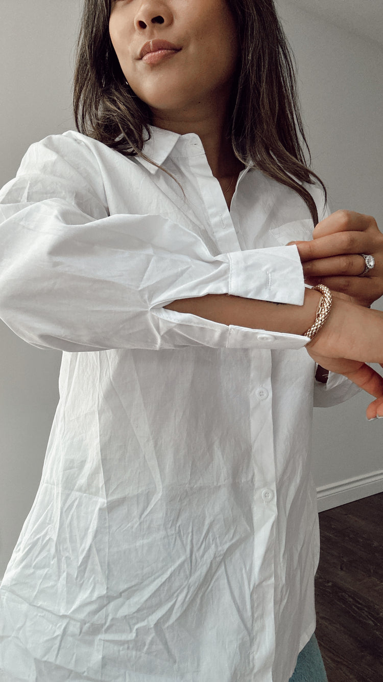 the white button down top