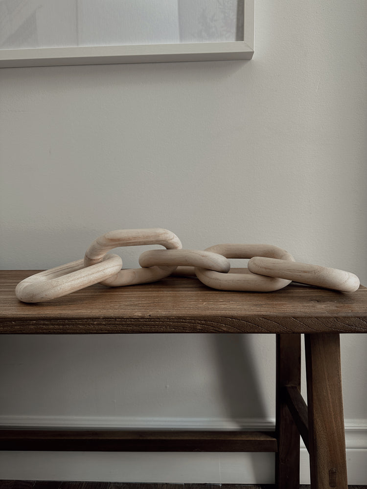 carved wood links in natural