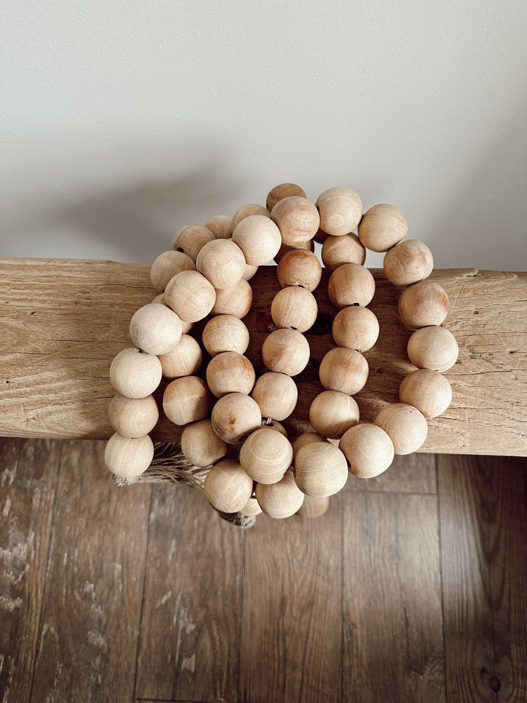 wooden beads with jute tassels