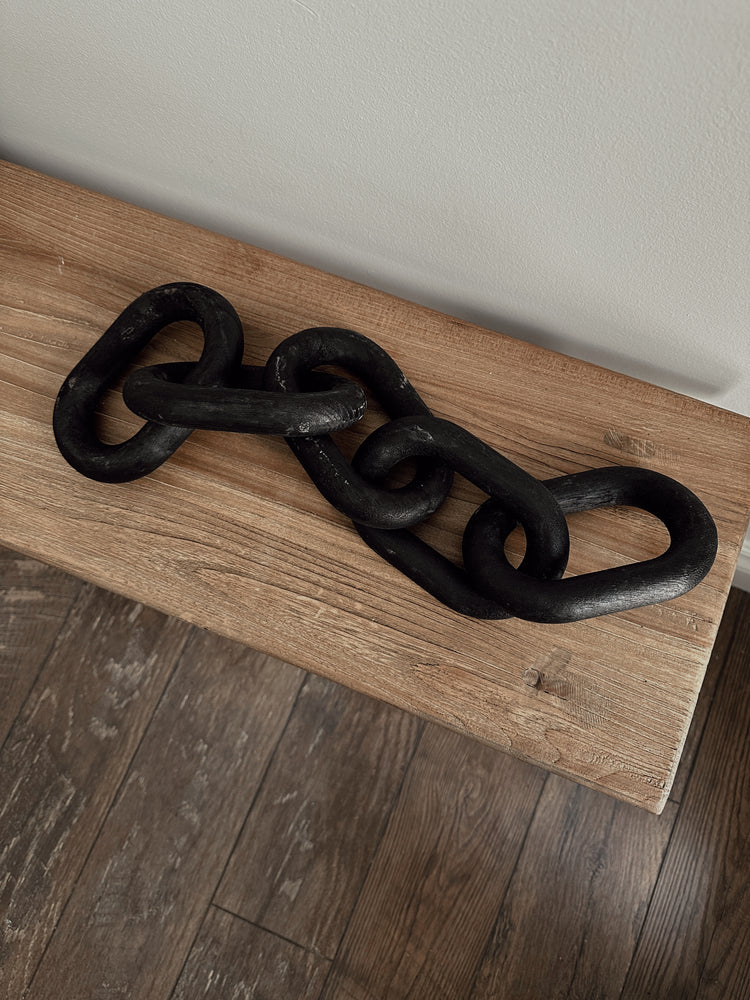 carved wood links in black