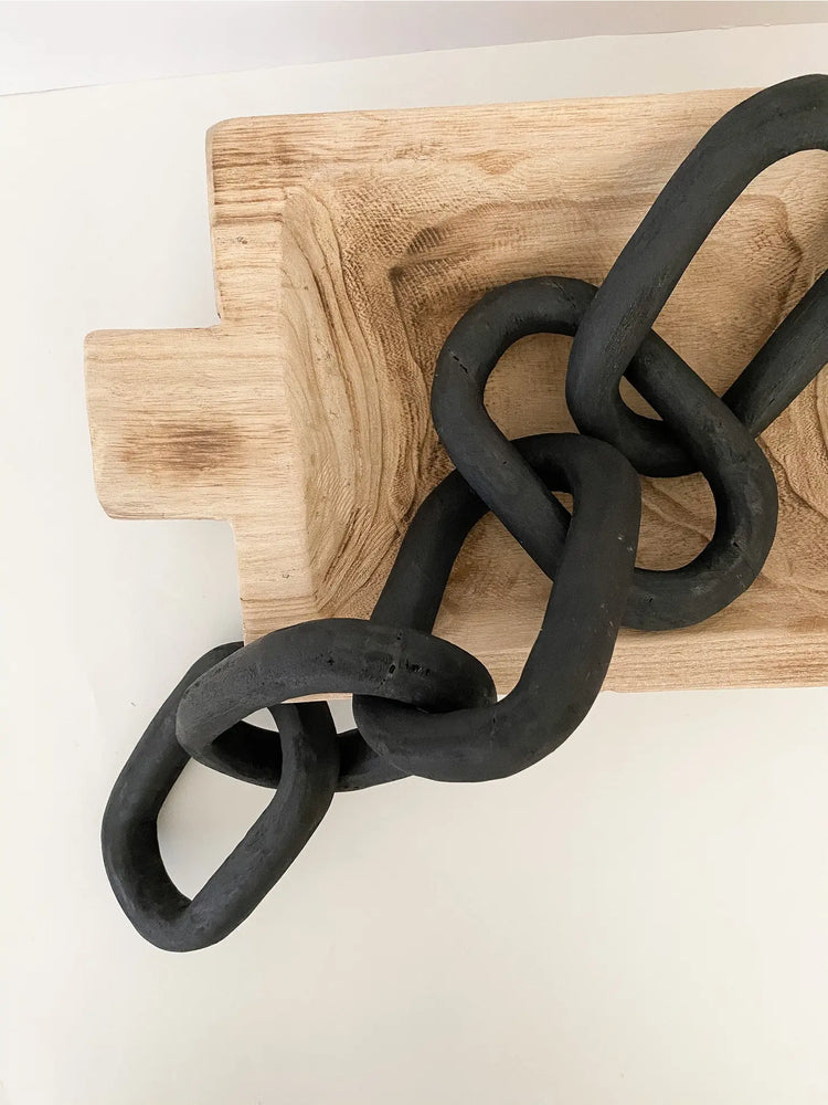 carved wood links in black