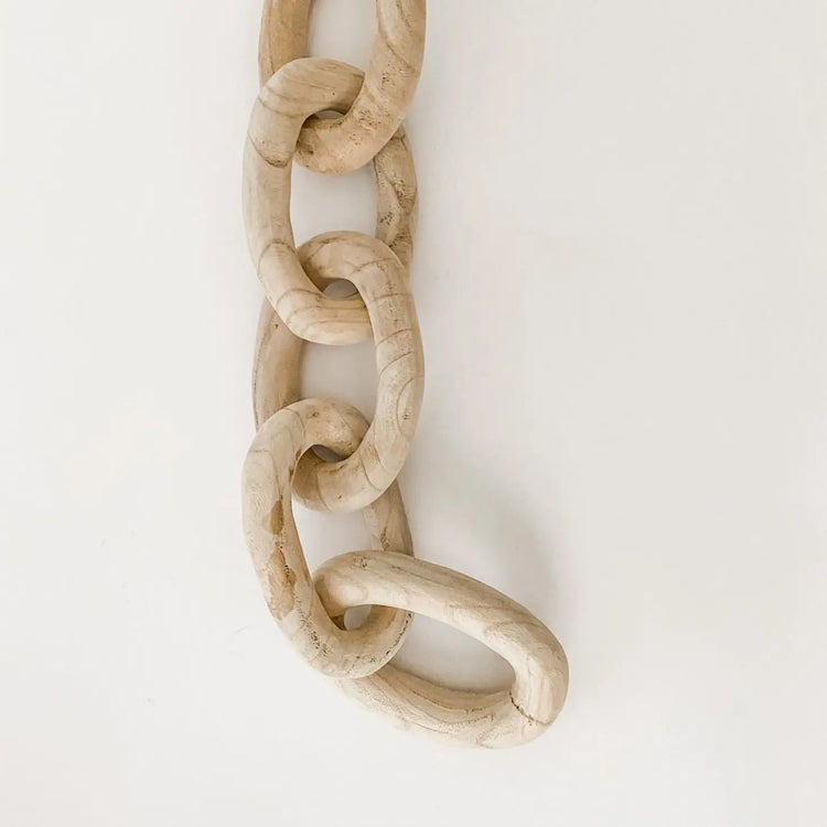 carved wood links in natural