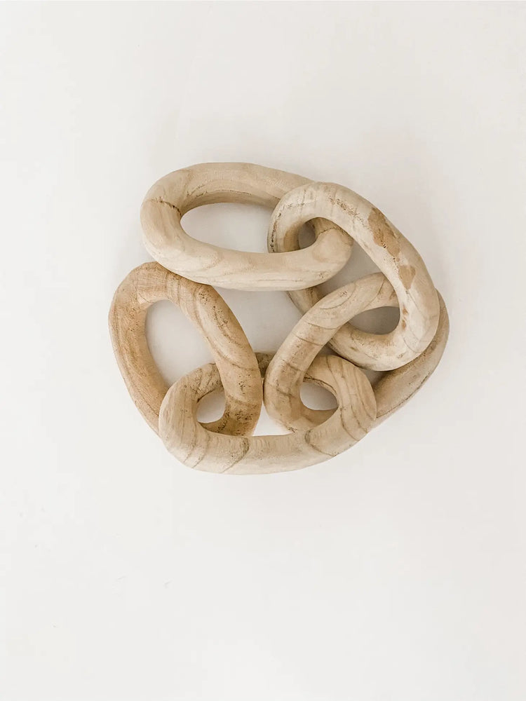 carved wood links in natural