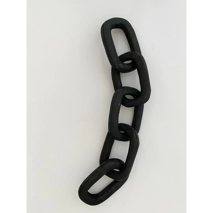 carved wood links in black