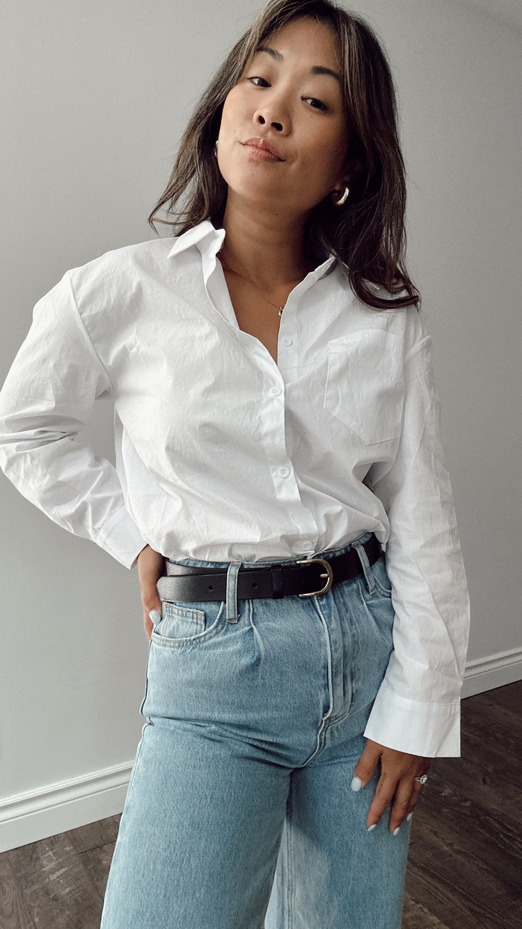 the white button down top