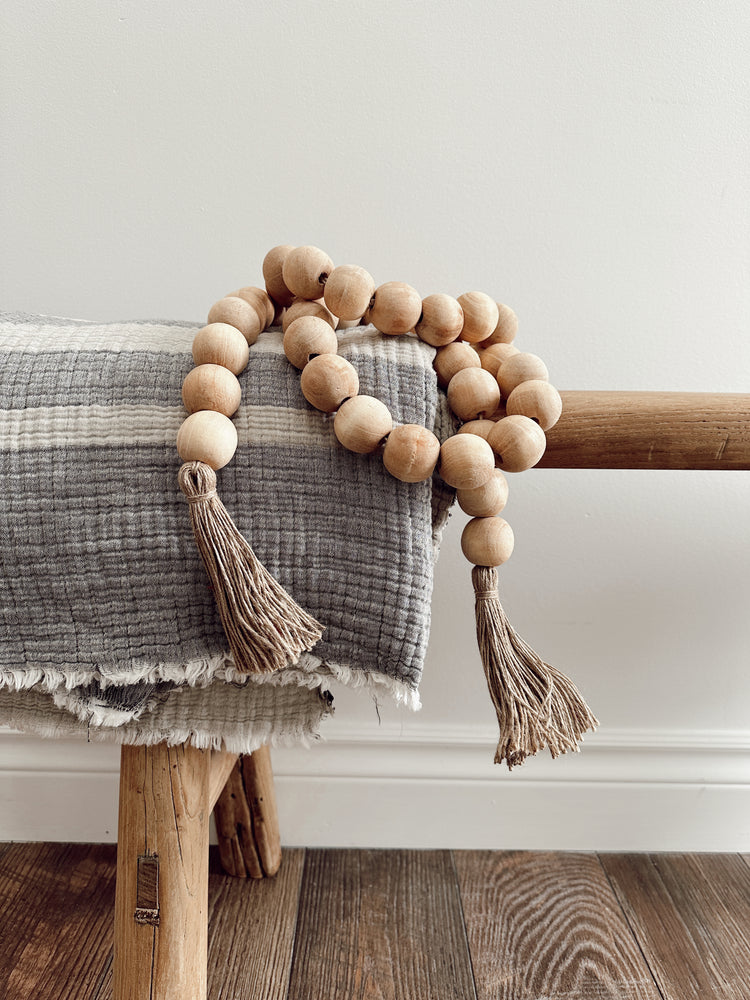 wooden beads with jute tassels