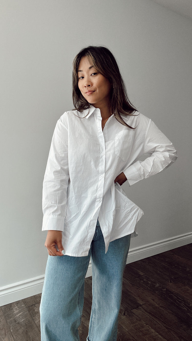 the white button down top