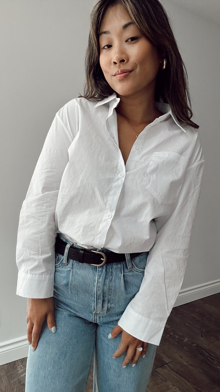 the white button down top